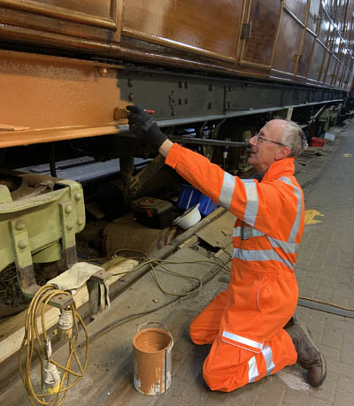 Douglas painting the north side