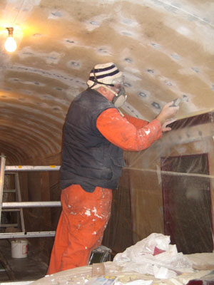 George sanding the ceiling