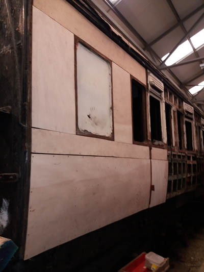 Compartment end panel fitted